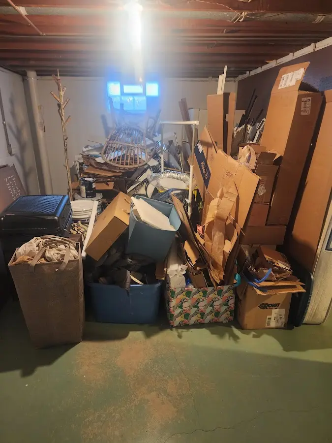 Roll-off dumpster container at job site for 20 Yard Dumpster Rental in Newfane